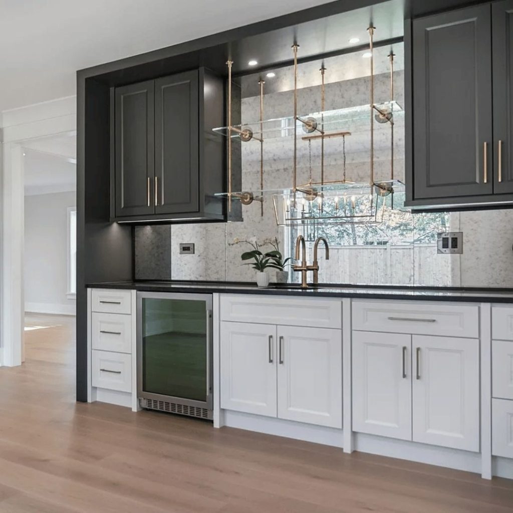 Millennium Grey slab-door kitchen cabinets by CCC Cabinets