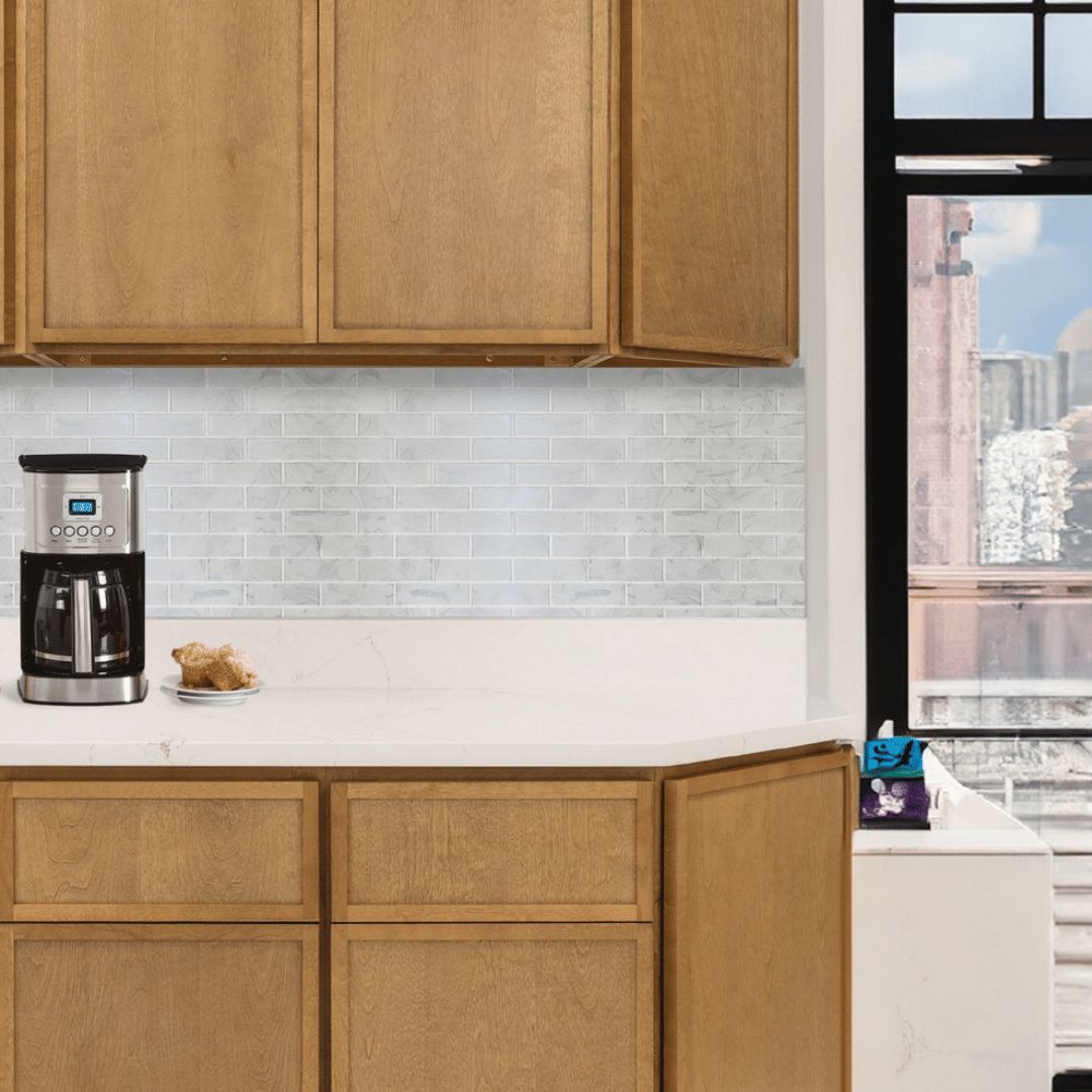 Cappuccino kitchen wall and base cabinets with a tile backsplash and coffee station