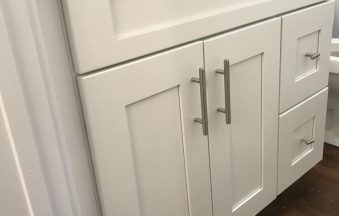 Pure White shaker cabinet doors and drawer fronts in close-up with bar-pull hardware